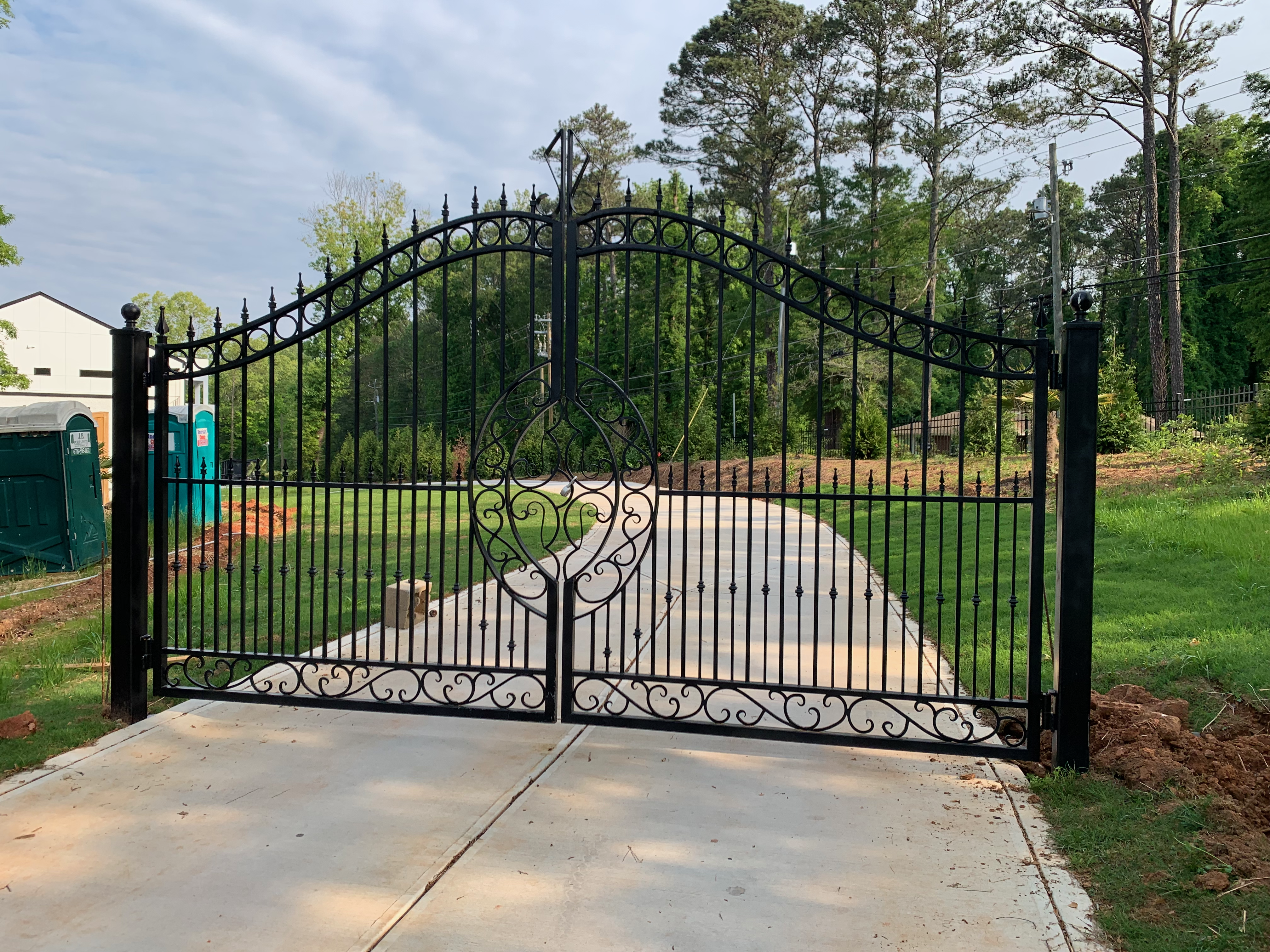 Custom iron driveway gate